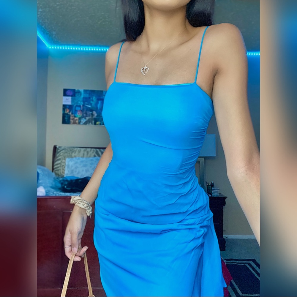 Niki Liva’s 90’s Turquoise maxi dress